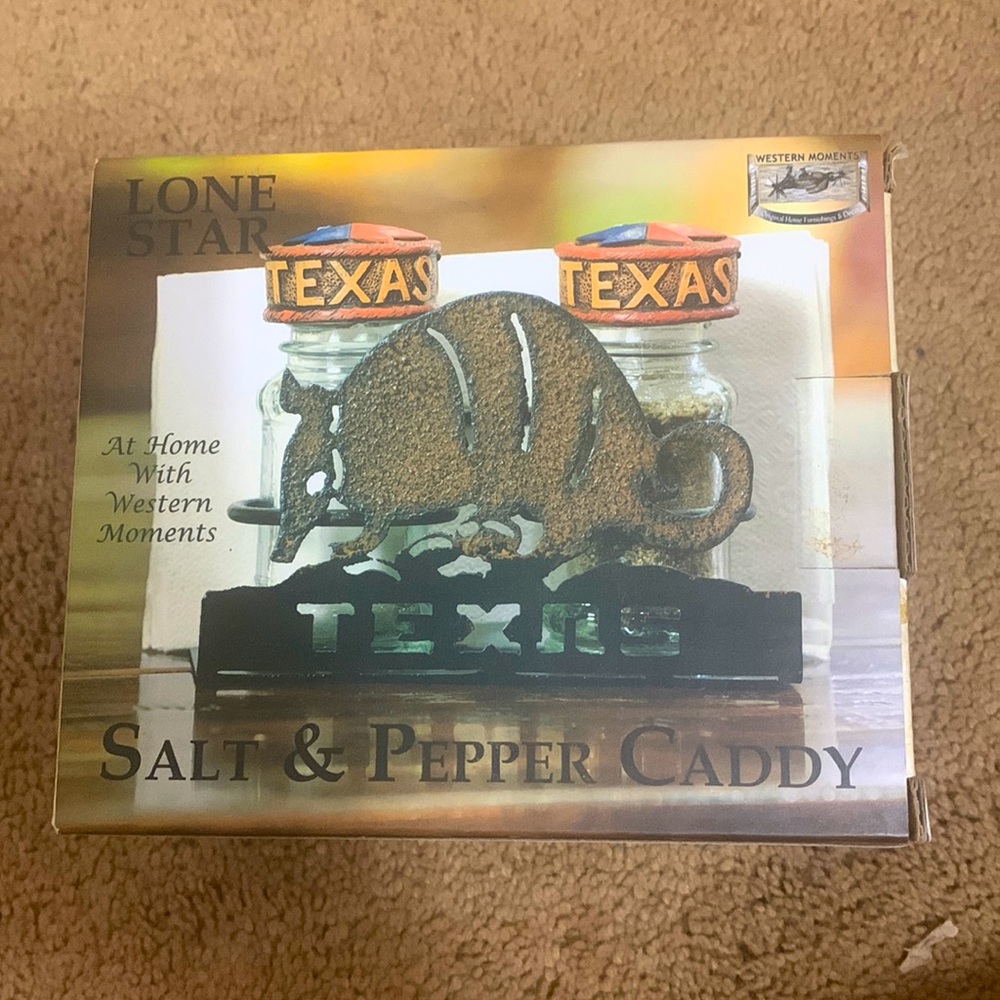Salt and pepper shakers and caddy